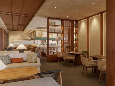 Moderner Hotel-Loungebereich mit Holzakzenten, Regalen und gemütlichen Sitzgelegenheiten.