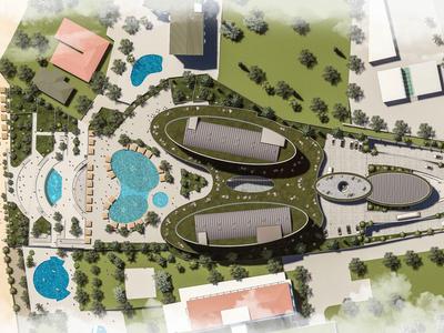 Vista aerea di un complesso alberghiero di lusso con piscine e area spiaggia sulla costa.