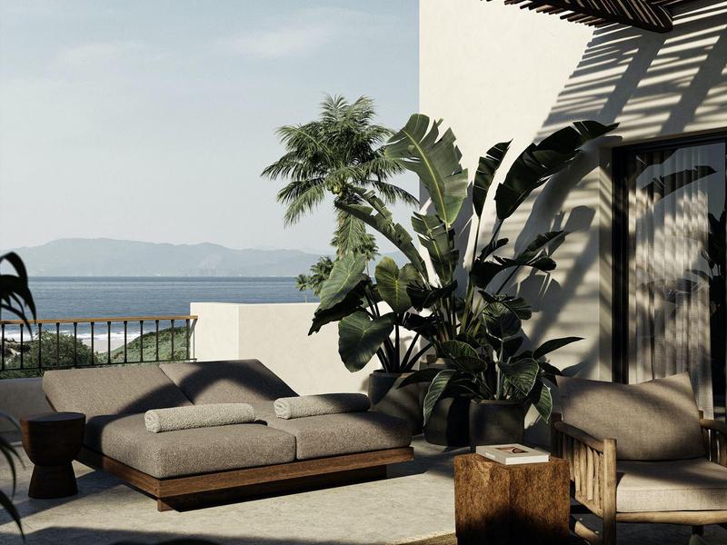 Terraza soleada de hotel con muebles modernos de madera y plantas tropicales, vista al mar al fondo.