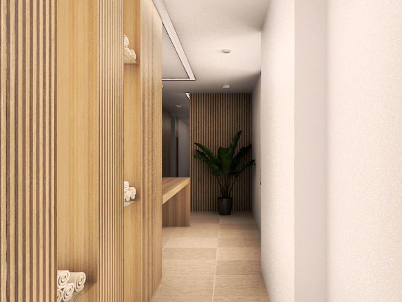 Schmaler Flur mit hellem Boden, minimalistischer Holzvertäfelung links und weißer Wand rechts.