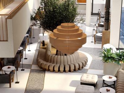 Großer heller Raum mit runden Holzskulpturen, Sitzgruppen und grünen Pflanzen, modern gestaltet.