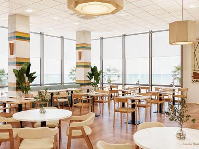 Luminoso ingresso dell'hotel con sedie in legno, tavoli e grandi finestre con vista sul mare.