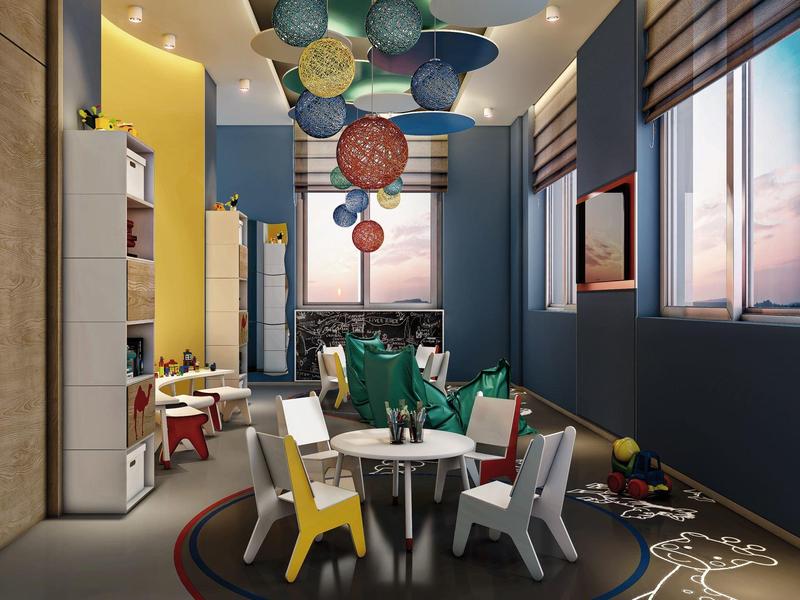 Modern hotel lobby with wooden slatted ceiling and large windows overlooking outdoor greenery.