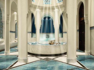 Helle Moschee mit Marmorböden, weißen Säulen und lichtdurchflutetem Innenraum.