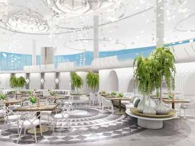 Moderní, světlý interiér s posezením, rostlinami a velkými okny v hotelu.