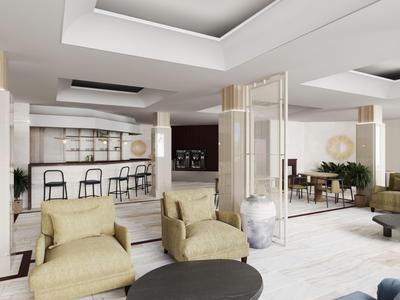Helles Hotel-Lounge mit bequemen Sesseln, runden Tischen und Bar im Hintergrund.