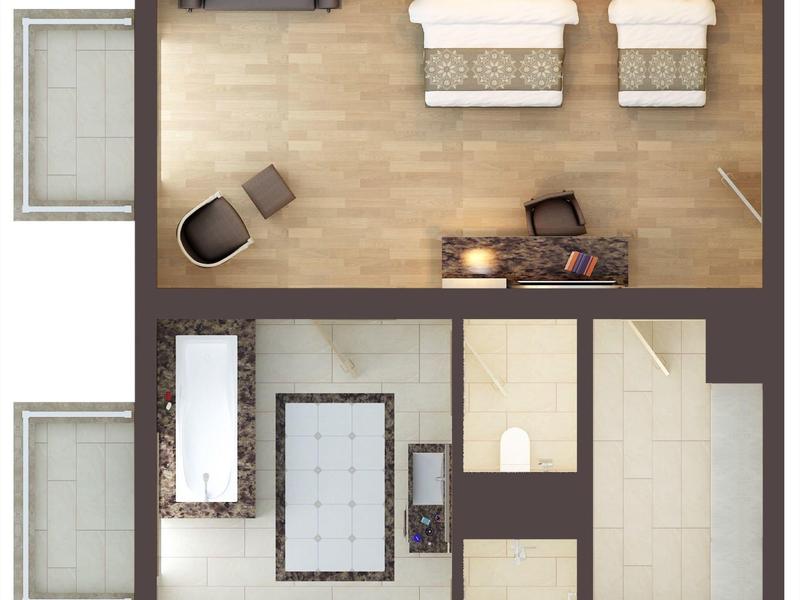 Floor plan of a hotel suite with two beds, living area, bathroom, and kitchenette.
