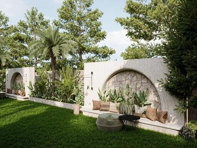 Jardín con césped verde, plantas mediterráneas y muros blancos con arcos bajo un cielo soleado.