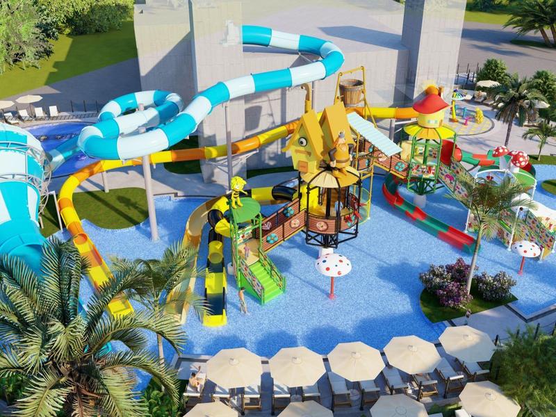 Park wodny z kolorowymi zjeżdżalniami, parasolami i tropikalnym otoczeniem.