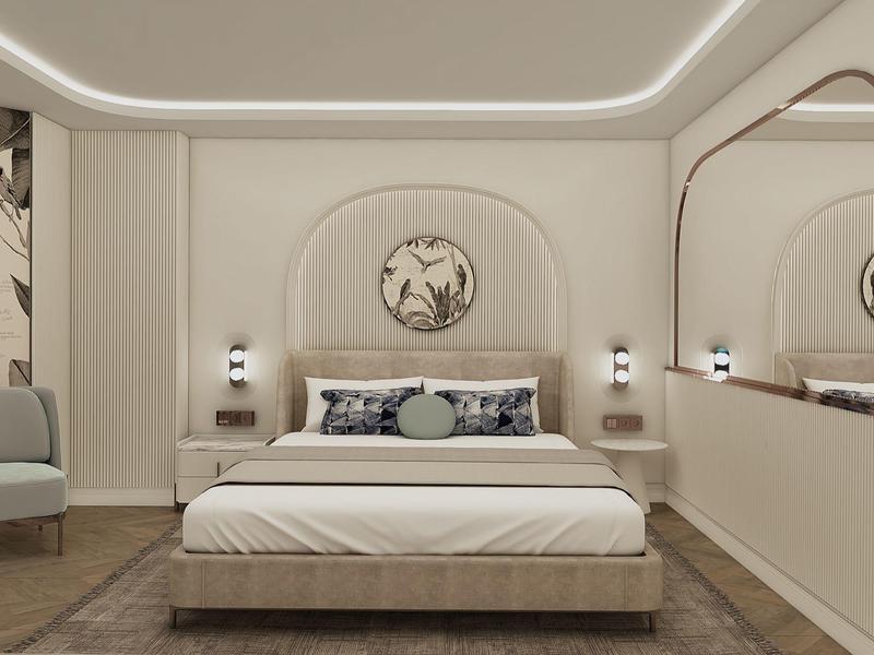 Modern hotelkamer met groot bed, ronde spiegels en minimalistische verlichting