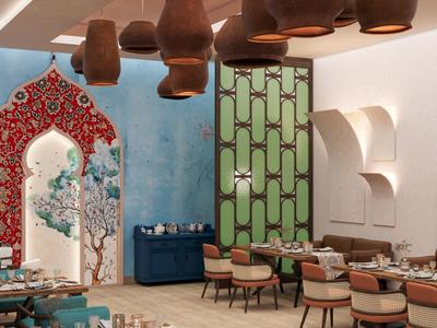 Restaurant élégant au décor coloré d'inspiration orientale avec des sièges confortables.