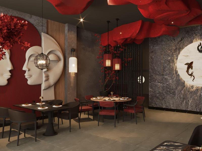 Restaurant moderne avec des têtes blanches décoratives sur le mur et un éclairage rouge au plafond.