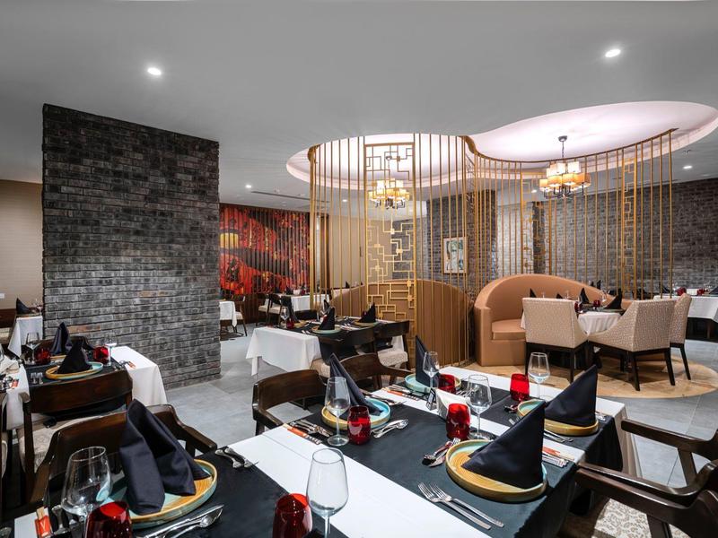 Modern restaurant with stylishly decorated tables and comfortable seating areas