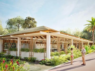 Edificio moderno de restaurante al aire libre en un entorno tropical rodeado de vegetación.