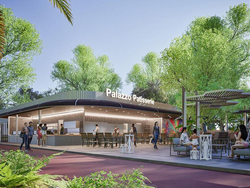 Restaurante exterior moderno con asientos, rodeado de árboles y caminos verdes.