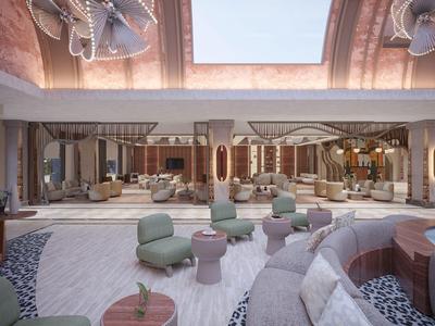 Salón moderno de hotel con sofás curvos, sillones verdes y grandes espejos en la pared.