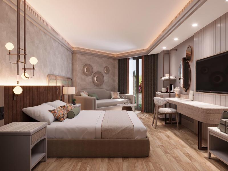 Chambre d'hôtel moderne avec lit double, canapé, télévision à écran plat et éclairage élégant.