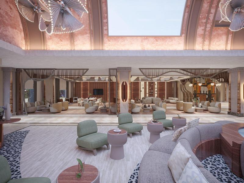 Luksusowa przestrzeń lobby hotelowego z eleganckimi meblami i pośrednim oświetleniem pod szklanym dachem.