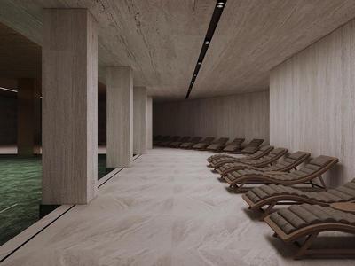 Area benessere moderna con piscina interna e lettini in legno lungo il lato.