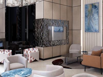 Elegante hotel lounge met moderne stoelen, wandkunst en marmeren details.