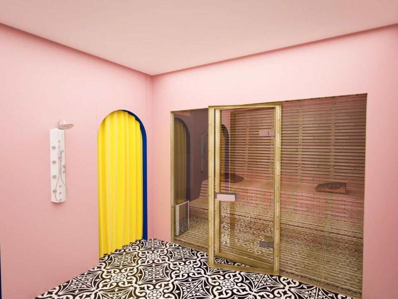 Innenraum mit rosa Wänden, gemustertem Schwarz-Weiß-Boden, gelber Tür und Glaswand mit Holzrahmen.