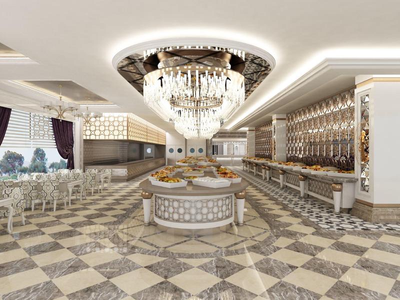 Großer, luxuriöser Speisesaal mit Marmorfußboden, opulantem Kronleuchter und eleganter Buffetinsel.