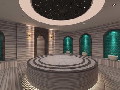 Okrągła łaźnia parowa z centralną platformą, sufitem z motywem gwiazd i podświetlanymi niszami.