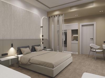 Habitación de hotel moderna con cama grande, escritorio y área de estar en tonos neutros.