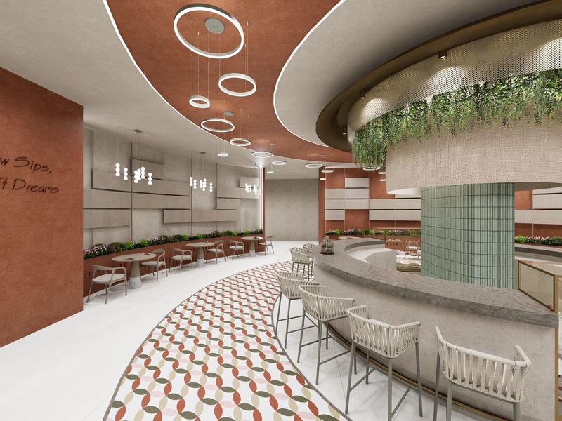 Nowoczesne wnętrze restauracji z zakrzywionymi wzorami na suficie i podłodze, barem i miejscami do siedzenia.