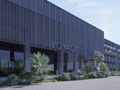 Moderní hotelová budova s velkou skleněnou fasádou a rostlinami v popředí