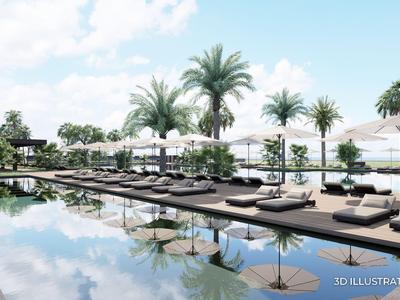 Luxurious pool area with loungers, palm trees, and umbrellas at a hotel resort.