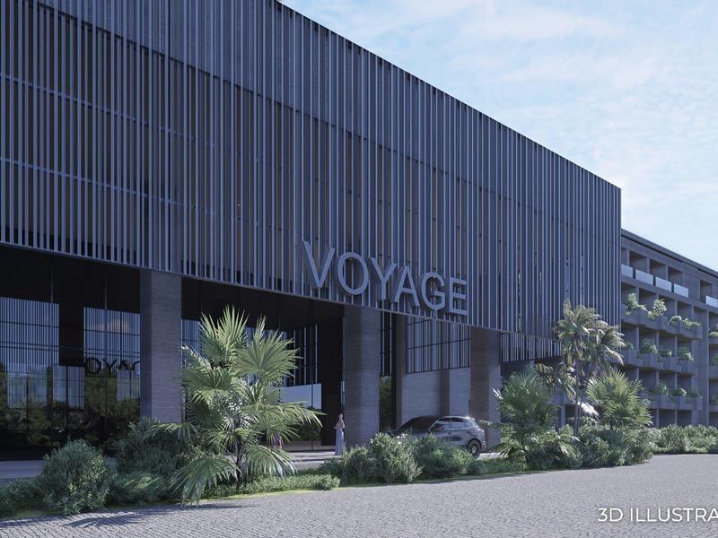 Moderní hotelová budova s velkou skleněnou fasádou a rostlinami v popředí