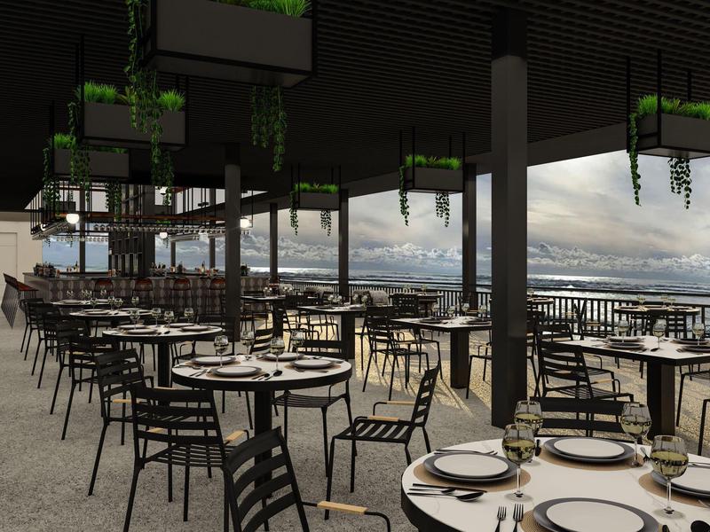 Area pranzo aperta con sedie e tavoli neri, piante sospese sopra, vista mare sullo sfondo.