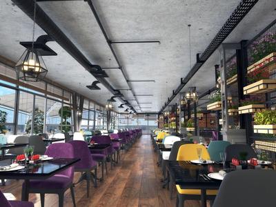 Modern restaurant met kleurrijke stoelen en grote ramen met uitzicht naar buiten.