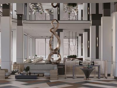 Lobby di hotel luminosa e moderna con zone salotto, scultura artistica e pavimento geometrico.