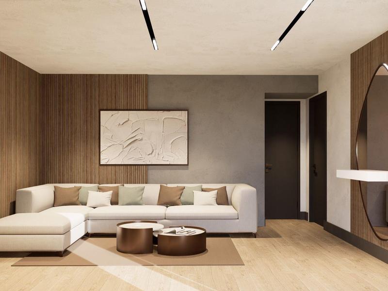 Moderner, heller Wohnraum mit weißem Ecksofa, braunen Hockern und rundem Spiegel mit Regal.