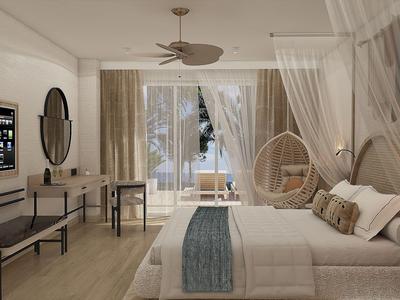 Nowoczesny pokój hotelowy z łóżkiem, biurkiem, wiszącym fotelem i balkonem z widokiem na morze.