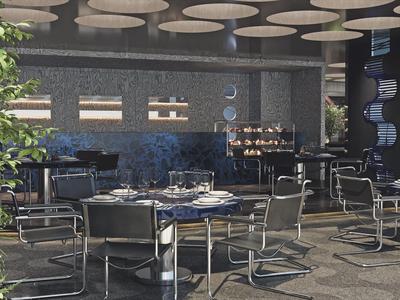 Modern hotel dining area with gray chairs and round tables under a ceiling with circular elements.