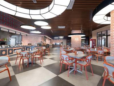 Modern hotel dining area with stylish red chairs and large ceiling lights.
