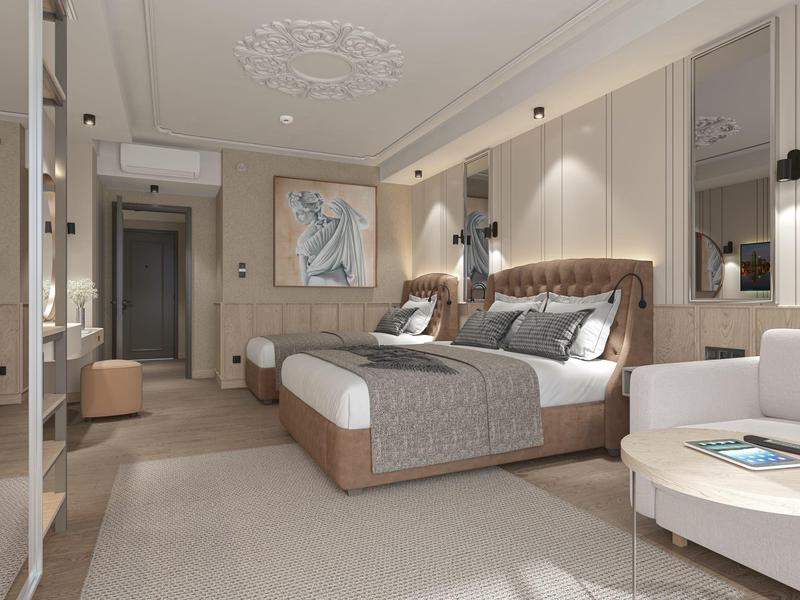 Elegante camera d'hotel con letto grande, illuminazione soffusa e arredi moderni in toni neutri.