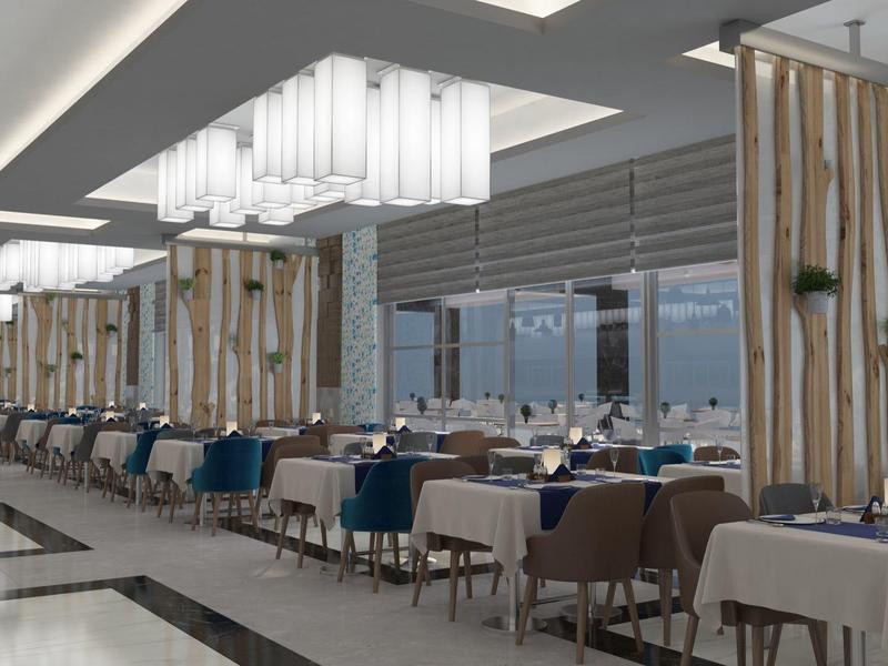 Salle à manger moderne avec des tables élégantes, des chaises et des cloisons en bois décoratives.