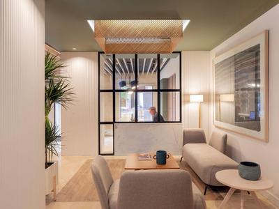 Modern waiting area with comfortable chairs and muted colors.