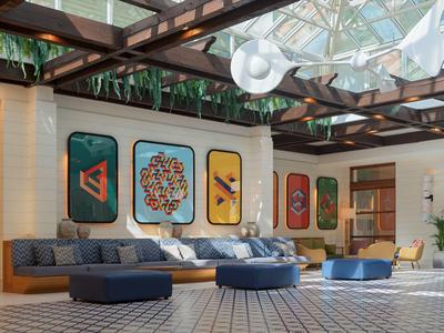 Jasny salon hotelowy z nowoczesną sztuką, wygodnymi miejscami do siedzenia i szklanym sufitem