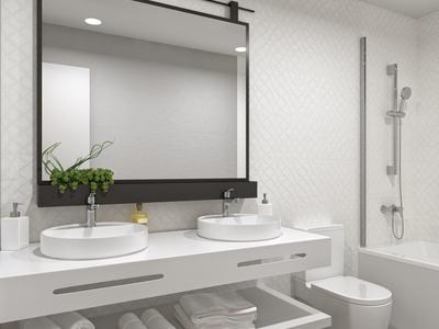 Nowoczesna łazienka z podwójną umywalką, dużym lustrem i wanną w jasnej kolorystyce.