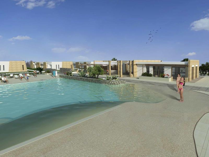 Modern hotel pool with lounge chairs and people on a sunny day