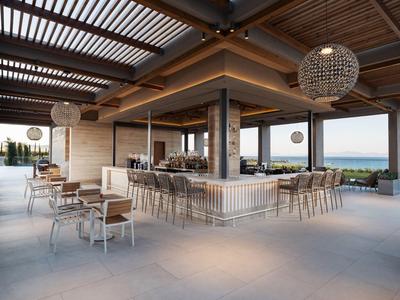 Moderne offene Bar mit Holzdecke und Meerblick in einem Hotel.