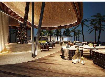 Modern outdoor lounge with wooden deck, comfortable seating, and lanterns at night