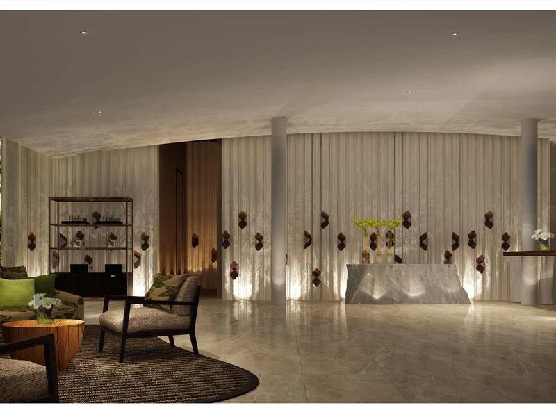 Modern hotel lounge with cozy seating and warm lighting.