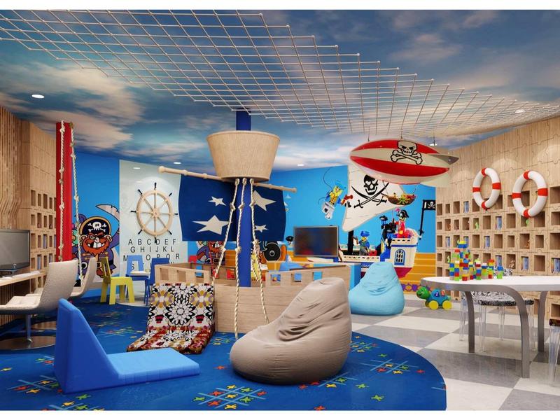 Colorful children's playroom with bean bags, pirate decor, and play materials.