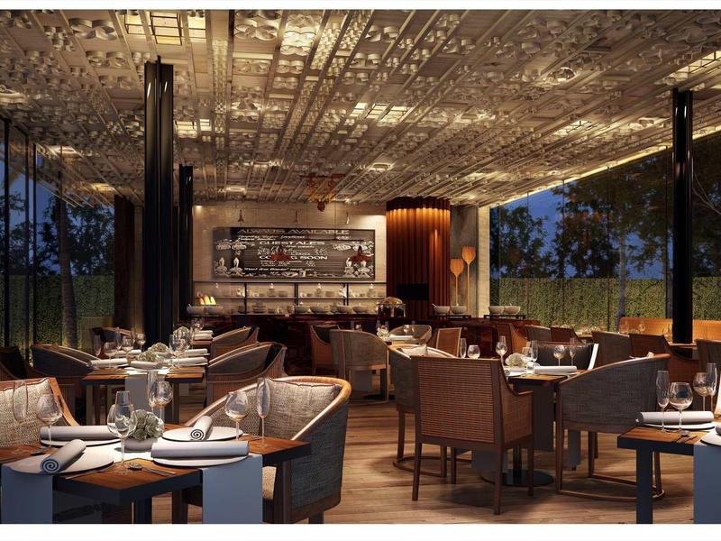 Elegant restaurant with modern furniture and ambient evening lighting.